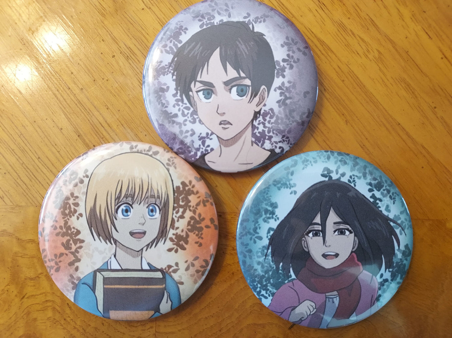 Eren, Mikasa and Armin 2.25 Pin Back Buttons with FREE STICKER